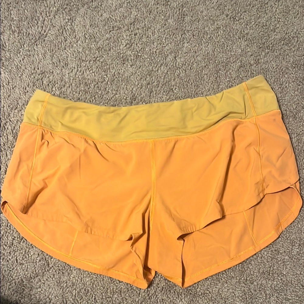 Lululemon 2.5” High rise speed ups - orange soda